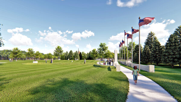 Sunny park with American flags and walking people.